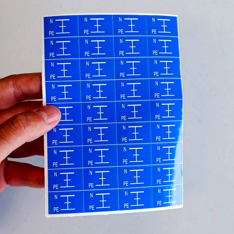 Product view of Blue Grounding Symbol Stickers.