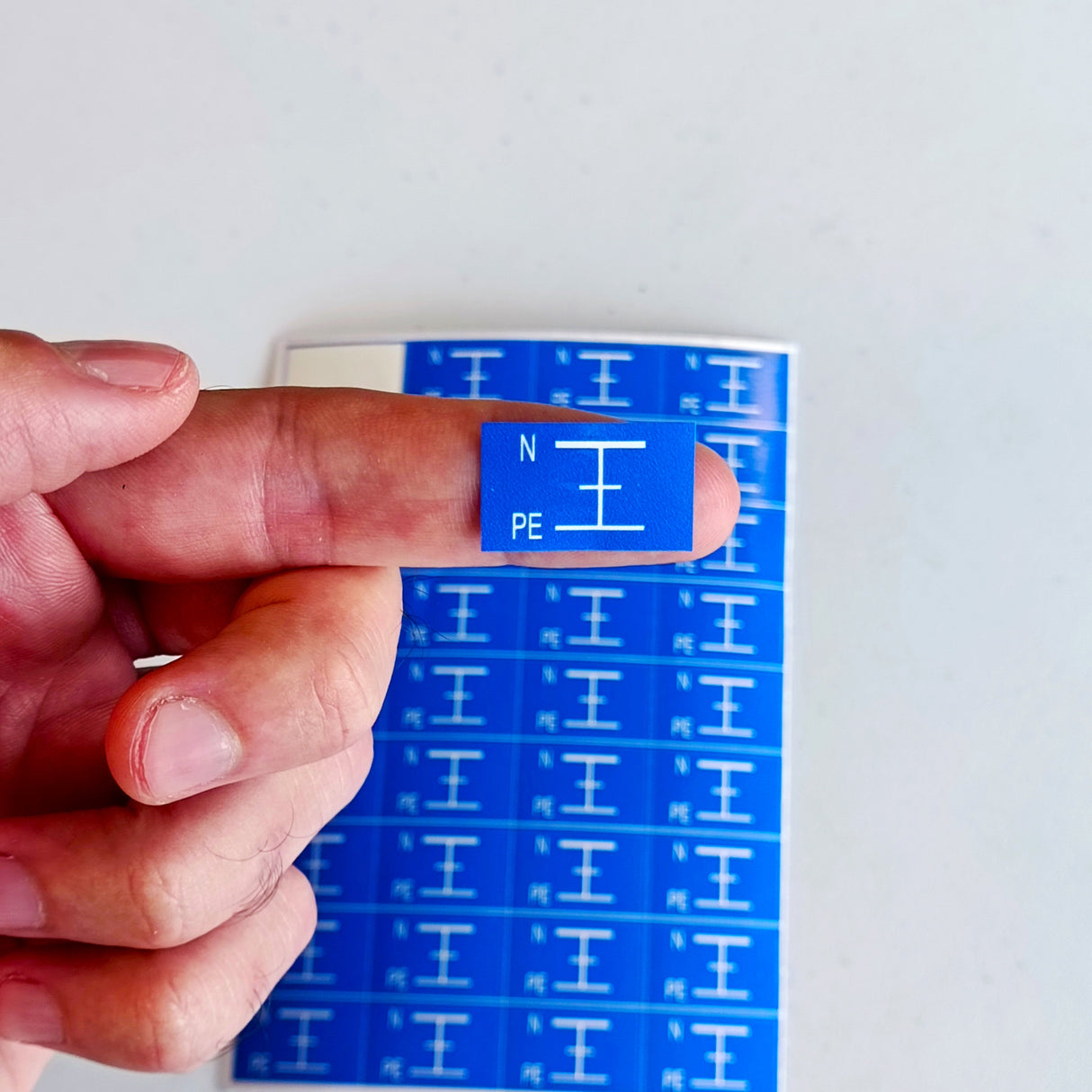 Alternate product view of Blue Grounding Symbol Stickers.