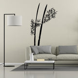 Minimalist bamboo plant vinyl wall decal displayed in an interior.