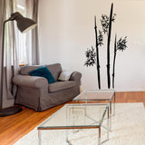 Minimalist bamboo stem and leaf vinyl wall decal displayed in an interior.