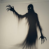 Eerie spooky shadow wall sticker depicting a ghostly figure with glowing eyes and claws.