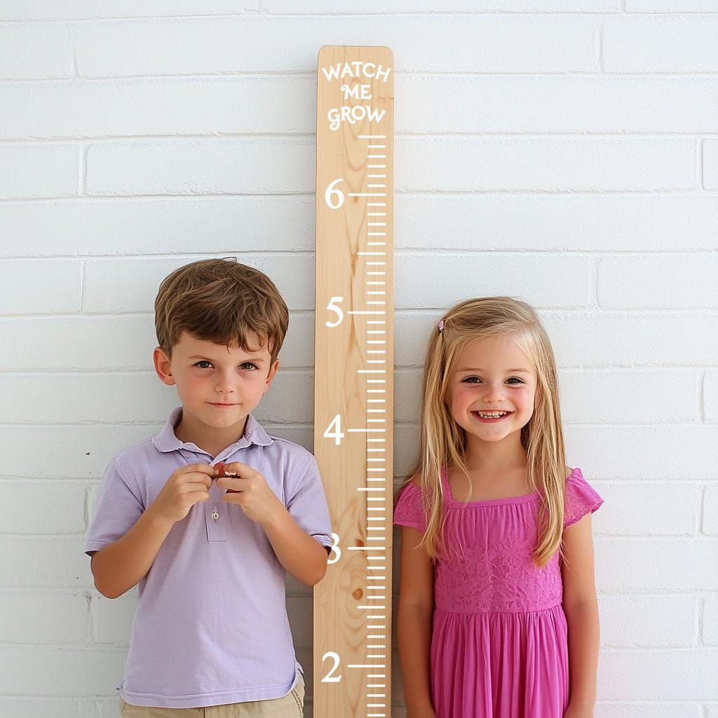 Alternate product presentation of Vinyl Growth Chart Decal in Feet with 27 White Arrow Stickers.