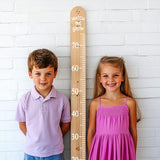 Alternate product presentation of Vinyl Growth Chart Decal in Inches with 27 White Arrow Stickers.