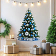 Blue and Silver Christmas Tree Wall Decal displayed in a room setting.