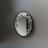 Custom etched mirror decal featuring an elegant floral design for home and office decor.