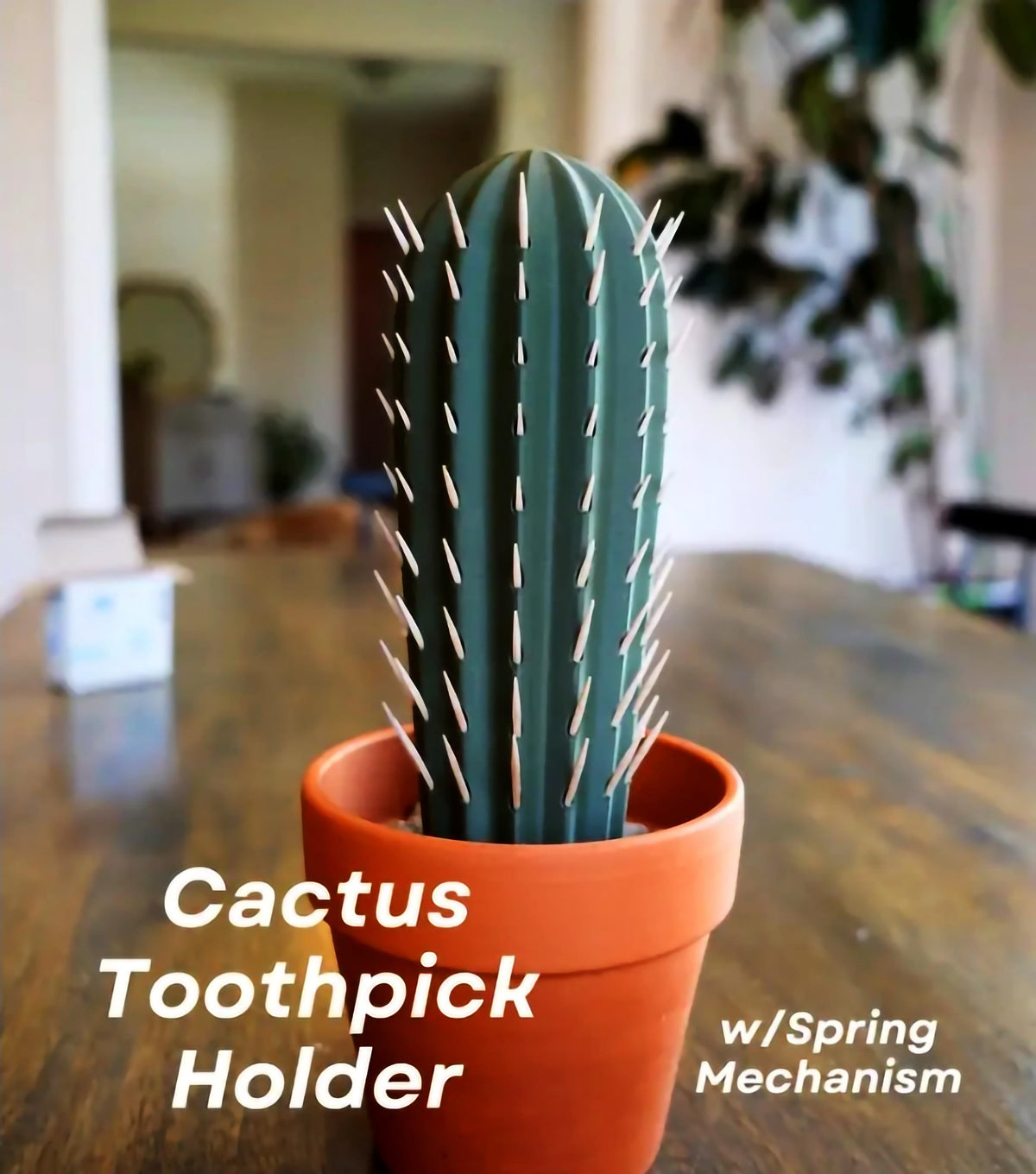3D printed cactus toothpick holder in pot with toothpicks resembling spines.