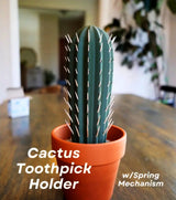 3D printed cactus toothpick holder in pot with toothpicks resembling spines.