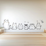 Cute Cat Wall Decal Set displayed in a room setting.