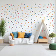 Colorful Polka Dot Wall Decal Set displayed in a room setting.