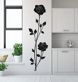 Vertical rose wall decal sticker in a modern kitchen, featuring elegant black roses and leaves.