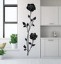 Vertical rose wall decal sticker in a modern kitchen, featuring elegant black roses and leaves.