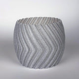 Modern gray zig zag planter cover, stylish 3D-printed decorative pot sleeve for indoor plants.