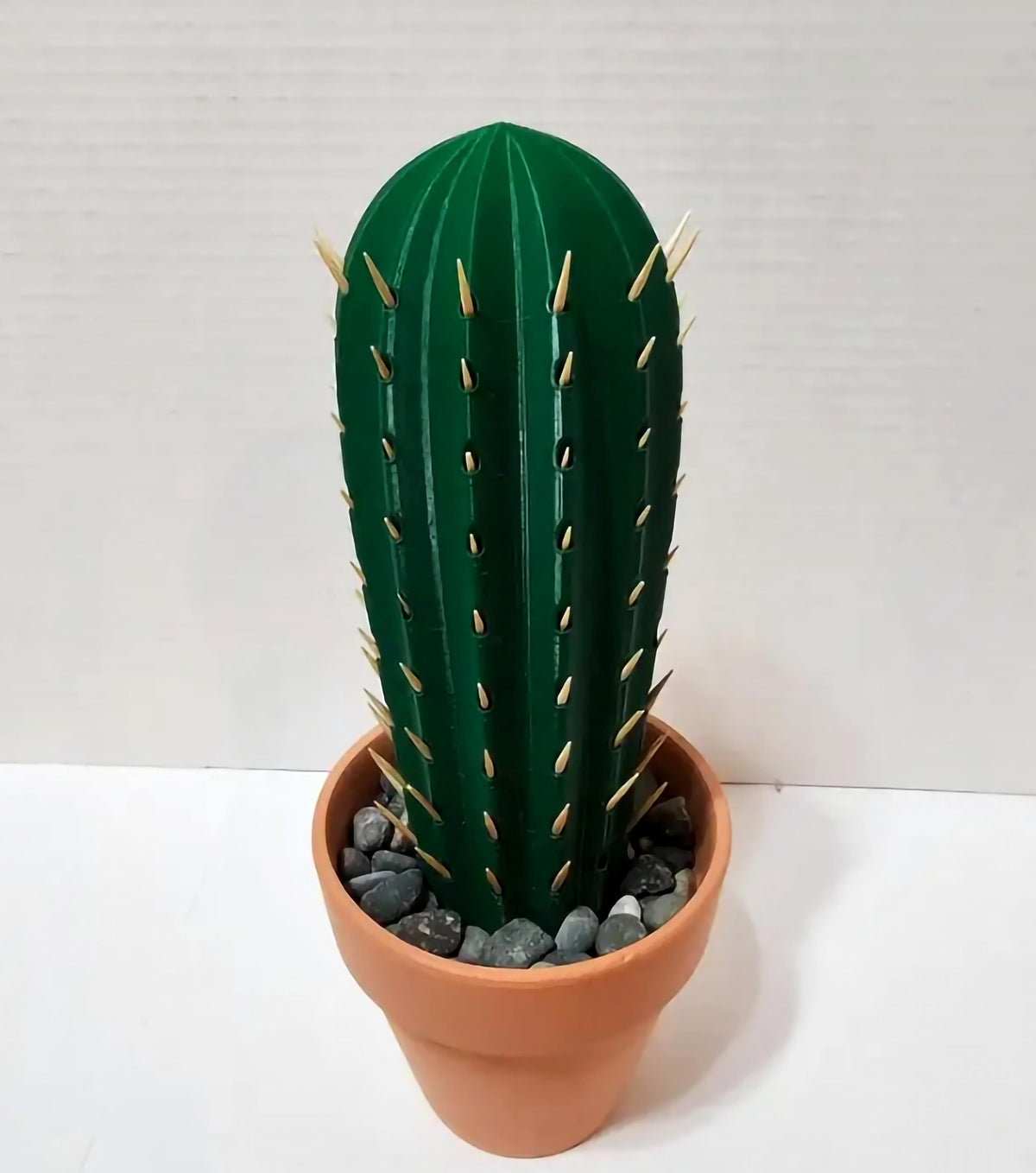 3D printed cactus toothpick holder with toothpicks as spines in a terra cotta pot.