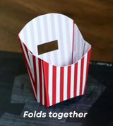 Origami-style red and white striped container folds together.