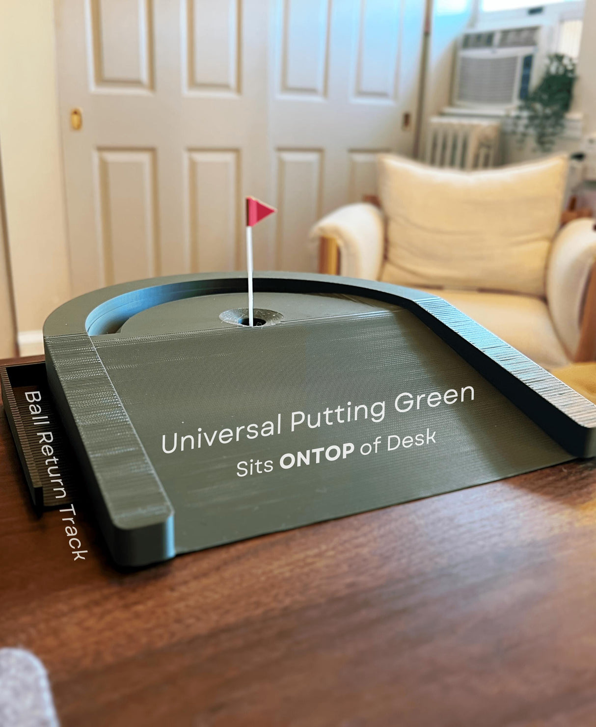Desktop golf game with ball return, compact putting green for desk.