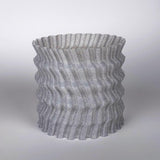 Modern zig zag planter cover, 3D printed decorative pot sleeve in gray for indoor plants.