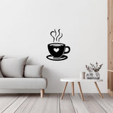 Stylish black coffee cup wall decal with heart detail and steam on white wall.