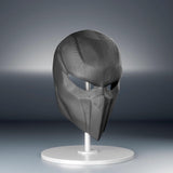 Black 3D printed futuristic tactical face mask with angular panels and narrow eye openings.