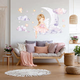 A whimsical wall decal showing a blonde fairy ballerina in a pink dress sitting on a crescent moon.