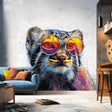 Printed vinyl wall decal of a Pallas's cat (manul) wearing large colorful sunglasses, with detailed fur in vivid colors.