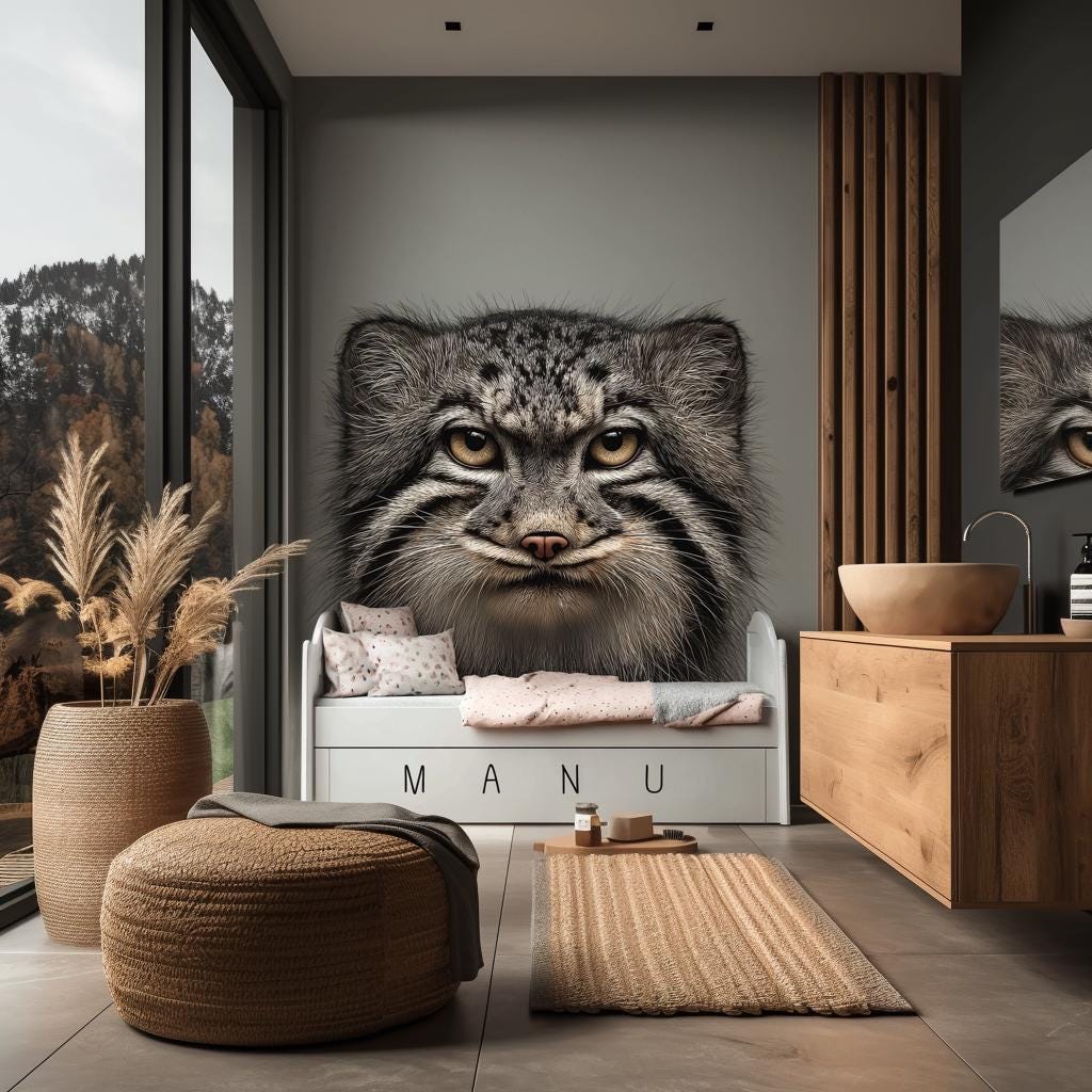 Large vinyl wall decal of a realistic Pallas’s cat face, printed in full color and applied to a wall above a child's bed.