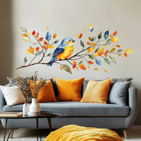 Vinyl wall decal of a watercolor-style bird sitting on a branch with colorful autumn leaves.