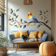 Vinyl wall decal of a soft watercolor-style bird sitting on a leafy branch.