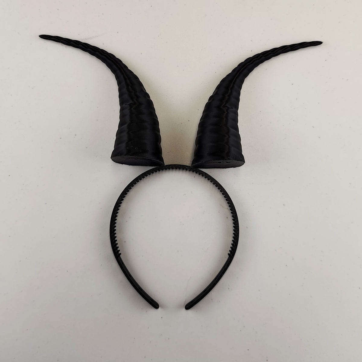 Alternate view of the curved fantasy horns headband.