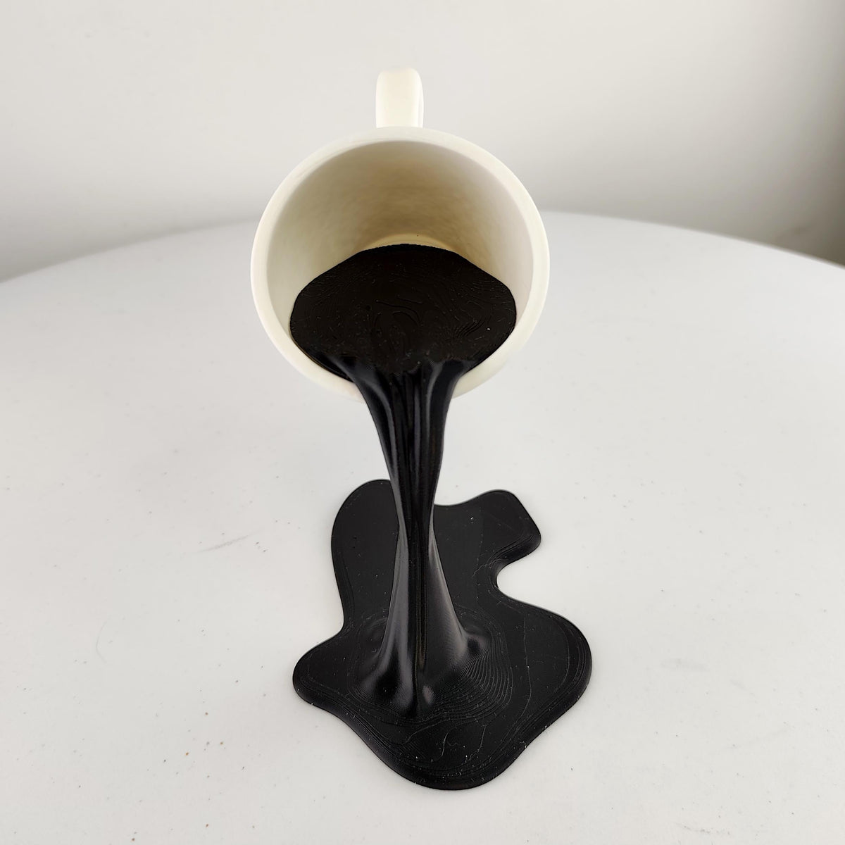 Product gallery view of Floating Coffee Cup Sculpture.