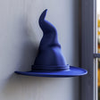 3D printed wall shelf shaped like a smooth, stylized dark blue wizard hat and matte PLA surface.