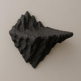 A 3D printed black wall shelf designed to resemble a jagged mountain peak or volcanic rock formation.