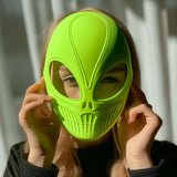 3D printed bright green alien mask with futuristic design, worn by an adult.