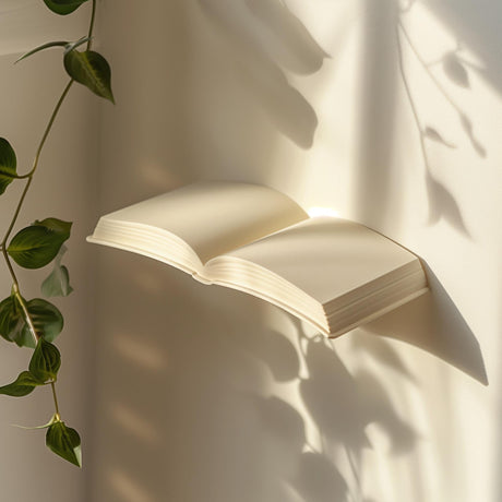 3D printed wall shelf shaped like an open book.