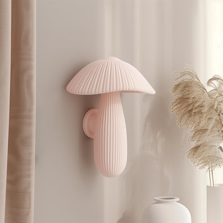 3D printed wall decor shaped like a soft pastel ribbed mushroom with elongated stem.