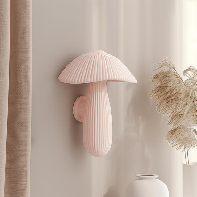 3D printed wall decor shaped like a soft pastel ribbed mushroom with elongated stem.