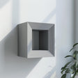 Square-frame 3D printed wall shelf with a geometric ledge for small decor.