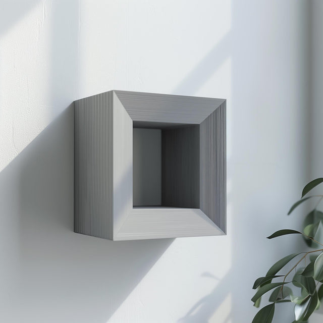 Square-frame 3D printed wall shelf with a geometric ledge for small decor.