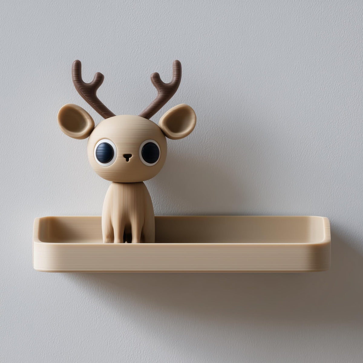 3D printed wall shelf with a small deer character with tall antlers sitting in a shallow tray.