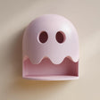 3D printed wall shelf shaped like a rounded ghost with eye cutouts and an open niche shelf below.