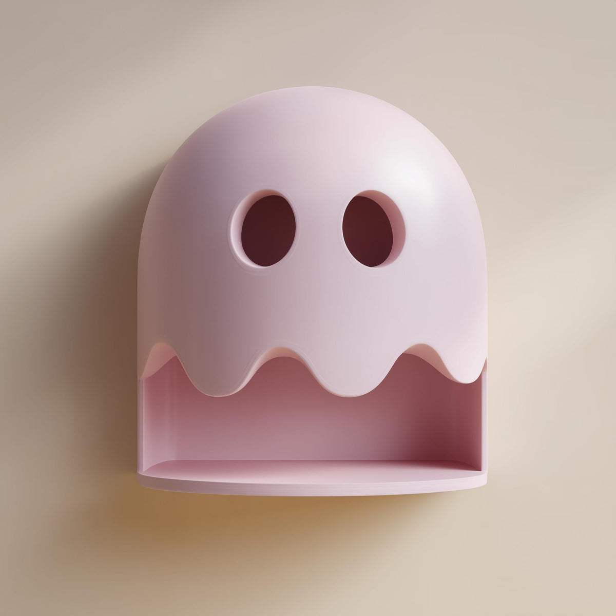 3D printed wall shelf shaped like a rounded ghost with eye cutouts and an open niche shelf below.