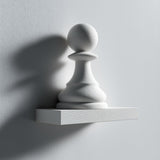 3D printed wall shelf with a large minimalist chess pawn integrated into a small rectangular ledge.