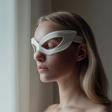 Futuristic lens-free 3D printed eye-mask frame with a sculptural wraparound shape.