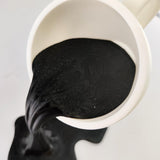 Alternate product presentation of Floating Coffee Cup Sculpture.