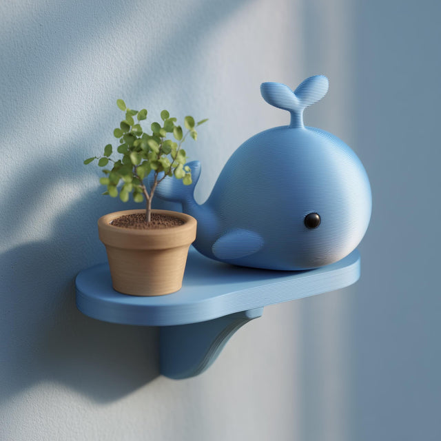 3D printed blue whale wall shelf with a small floating ledge.
