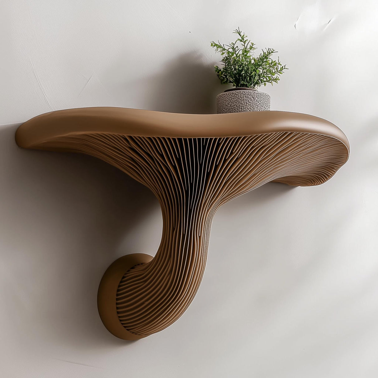 3D printed mushroom wall shelf with a rounded cap, sculpted stem and compact floating ledge.