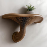3D printed mushroom wall shelf with a rounded cap, sculpted stem and compact floating ledge.