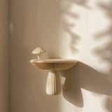 3D printed mushroom-shaped wall shelf made of matte PLA plastic.