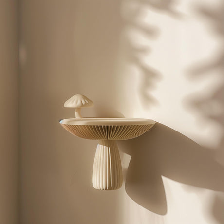 3D printed mushroom-shaped wall shelf made of matte PLA plastic.