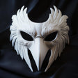 Feathered raven-style 3D printed bird mask with an elongated beak and sculpted eye openings.