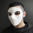 Man wearing a matte white 3D printed full-face cosplay mask with subtle contouring and wide eye cutouts.